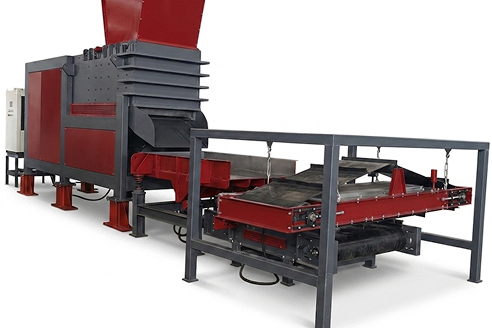 Fabtex Double Shaft Shredder processing E-waste, Tires, and MSW Recycling